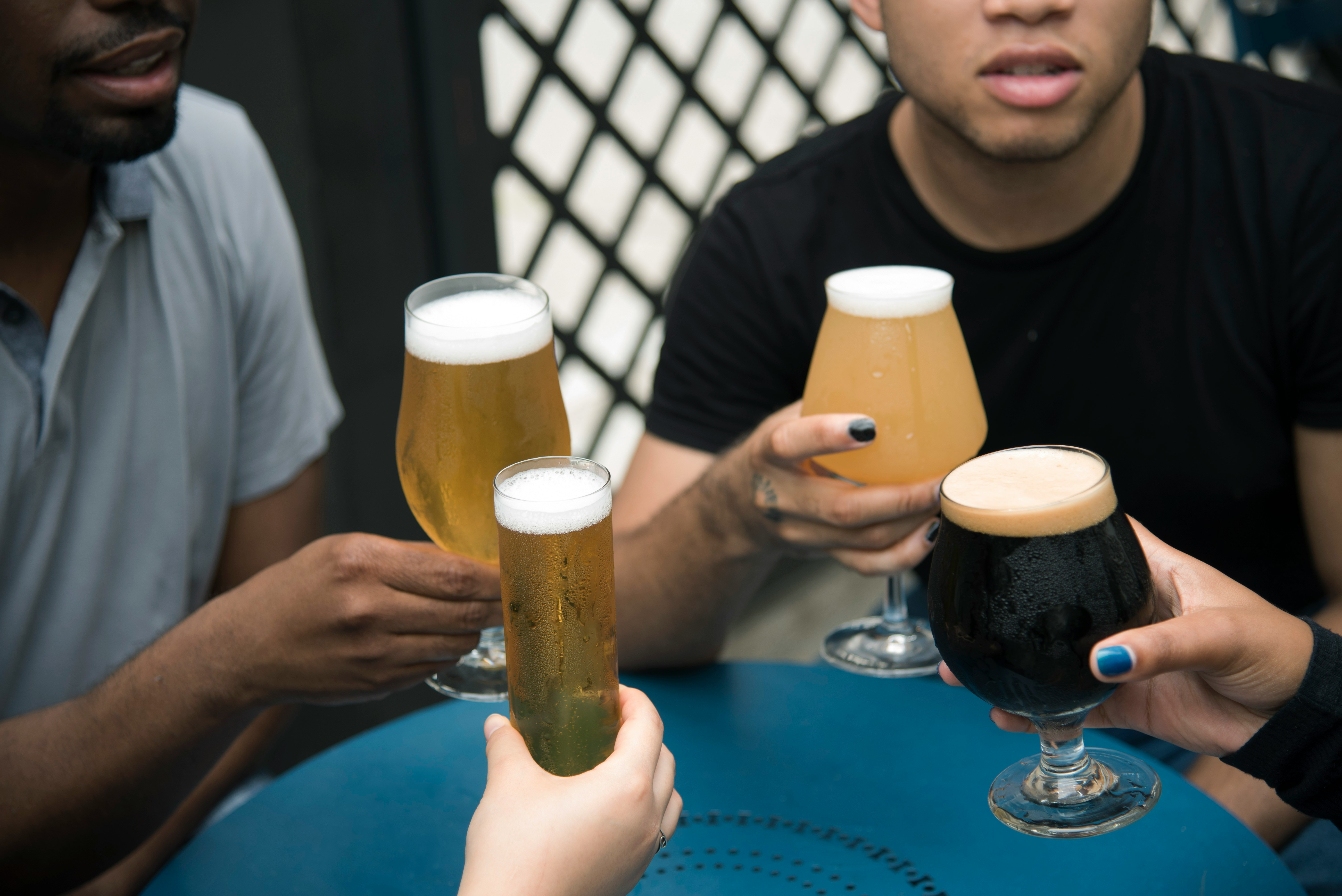 Friends cheering with beers